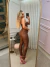CALÇA FEMININA SKINNY INTERMEDIÁRIA DE MATERIAL SINTÉTICO COM PALA CURVA na internet