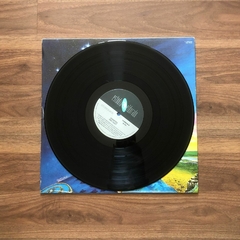 LP May East – Charites (1990) na internet