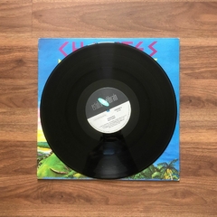 LP May East – Charites (1990) - Molotov Discos 