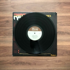 LP Riot – Born In America (1983) Importado US na internet