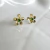 Brinco Flor Pequena Com Miolo Pedra Banhado a Ouro 18K - comprar online