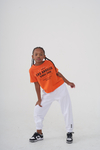REMERA LOS ANGELES CON TACHITAS NARANJA