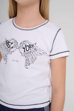 1142- REMERA NEW YORK ALAS BLANCO en internet