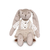 Coelhinho de pelúcia Bunny Joe vestido com camisa branca de bolinhas e um macacão listrado.
