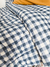 Acolchado reversible estampado Vichy azul - Suricornio
