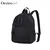 Mochila tela de avión combinada con ecocuero. Las Oreiro. negro
