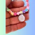 Pulseira Infantil flores Coloridas e Medalha Anjo da Guarda na internet