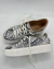 Sneakers reptil en internet