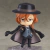 Figura de ação Nendoroid 676 do personagem Chuya Nakahara de Bungo Stray Dogs, vestindo um chapéu e uma capa, com uma pose confiante.