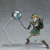 Figura de ação do Link, personagem de The Legend of Zelda: Twilight Princess, segurando uma arma com corrente e escudo.