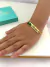 Pulseira infantil com trator