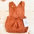 Romper Jardineira pompom terra Tricot