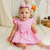 Romper sainha laço duplo algodão doce rosa