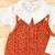 Macacão jardineira terra + body golinha - comprar online