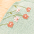 Romper jardineira verde flores + body guippir + faixinha - Titokinha
