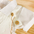 Macacão jardineira branco + body camisa - comprar online