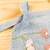 Romper jardineira tricot azul flores - comprar online