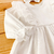 Imagem do Vestido branco babado lesie manga longa