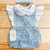 Romper Jardineira pompom azul bebê Tricot + Body guippir + Faixinha
