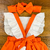 Romper sainha laranja c/ laço