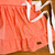 Vestido encanto babado e golinha salmão c/ laço - Titokinha