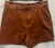 Shorts sarja com elastano vem com cinto