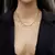 Collar con brillos y mariposas colgando. LP2 - comprar online