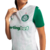 Camisa Palmeiras II 2025 Feminina, cor branca com mangas verdes, gola polo branca, estampa jacquard exclusiva, escudo oficial do Palmeiras no lado esquerdo do peito, logo PUMA em verde no lado direito e em branco nas mangas, além do patrocínio Sportingbet