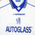 Camisa Retrô Reserva Chelsea Umbro 1999-2000 em branco, azul e amarelo. Detalhes da temporada com Gianfranco Zola e Marcel Desailly. Disponível na Tevo Sports.