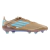 Chuteira Adidas F50 Elite FG Messi x Bad Bunny em dourado, azul e branco. Chuteira projetada para alta velocidade com tecnologia SprintWeb 3D para melhor controle de bola, PrimeKnit para ajuste moldado ao pé, e sistema de travas FG. Uma combinação de esti