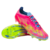 Imagem da chuteira Adidas F50 Elite FG do Mystic Victory Pack, nas cores rosa, verde e azul. Com a tecnologia Sprintframe 360 soleplate e Fibertouch upper, oferece aceleração e controle excepcionais. A texturização Sprintweb 3D proporciona maior precisão 