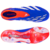 chuteira Adidas Predator 24 FG em três cores: azul predominante, com detalhes em branco e laranja. O modelo possui cano baixo, cadarço oculto por uma camada fina, e o símbolo da Adidas na lateral. Trata-se de uma chuteira profissional de futebol de campo,
