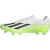 Chuteira de Campo Adidas X Crazyfast.1 FG Laceless Crazyrush nas cores verde, branco e preto. A chuteira está posicionada de lado, exibindo seu design minimalista e inovador. Detalhes em destaque incluem o cabedal Aeropacity Speedskin semi-translúcido, a 