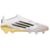 Chuteira Adidas F50 Elite FG Road to Glory nas cores branca, dourada, preta e roxa, com design moderno, sola Sprintframe 360 e acabamento profissional para futebol de campo.