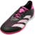 A imagem mostra uma chuteira futsal adidas Predator Accuracy.1 IC Own Your Football Pack. A chuteira é predominantemente preta, com detalhes em rosa Team Shock Pink no logo da adidas, no colarinho e na sola.  O modelo possui cadarço centralizado e cano mé