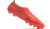 Chuteira Mizuno Alpha Made In Japan FG em Fiery Coral/White - Design leve e tecnologia Enerzy para máximo desempenho no futebol.