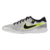 Chuteira Nike Society Tiempo Legend 10 Academy Mad Voltage em cinza, verde fluorescente e preta, com design elegante e micropontos para melhor controle de bola.
