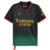 Quarta camisa do AC Milan 2025 Puma x Off-White, em preto e verde com degradê, gola polo preta com efeito grunge vermelho, setas icônicas da Off-White, escudo TPU 3D preto com "Diavoli" em vermelho, logo PUMA e patrocínios em amarelo chanfrado, número "63