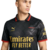 Quarta camisa do AC Milan 2025 Puma x Off-White, em preto e verde com degradê, gola polo preta com efeito grunge vermelho, setas icônicas da Off-White, escudo TPU 3D preto com "Diavoli" em vermelho, logo PUMA e patrocínios em amarelo chanfrado, número "63