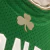  regata verde do Boston Celtics com o nome "Garnett" e o número "21" nas costas. A regata apresenta os logotipos clássicos da equipe e da Mitchell & Ness, além dos detalhes em verde e branco característicos da temporada de 2007-2008.