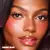Unreal Lip + Cheek Glow Blush Stick Charlotte Tilbury Cor: Cherry Glow