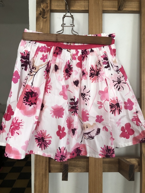 8A | Pollera floreada rosa con short abajo. OSHKOSH. 8 años.