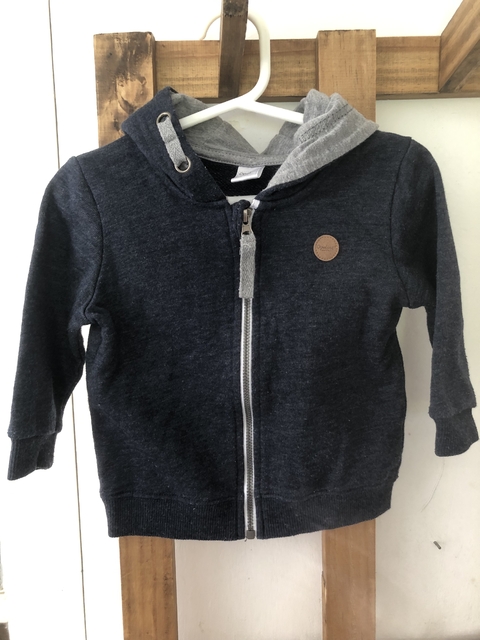 Outlet- Buzo azul con cierre y capucha. Opaline. 12 meses.