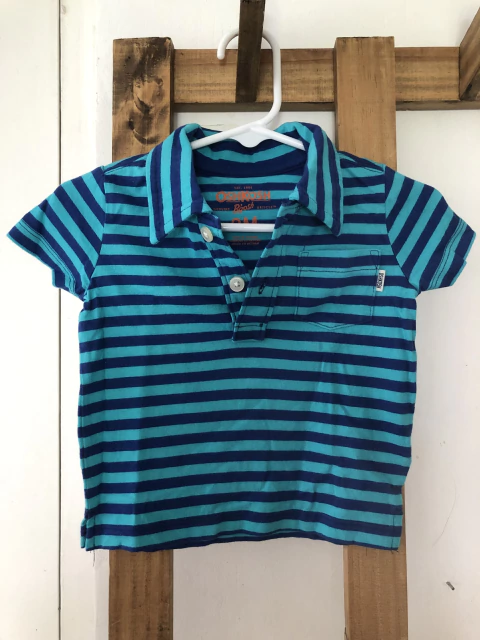 9M | Remera MC a rayas turquesa y azul. Oshkosh. 9 meses.