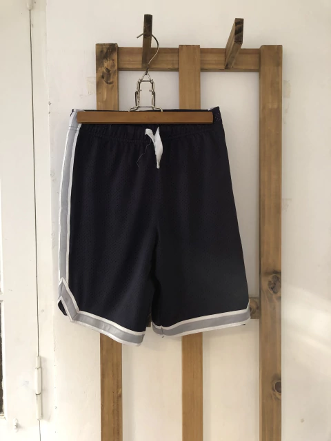 10A | Short deportivo azul. OSHKOSH. 10 años.