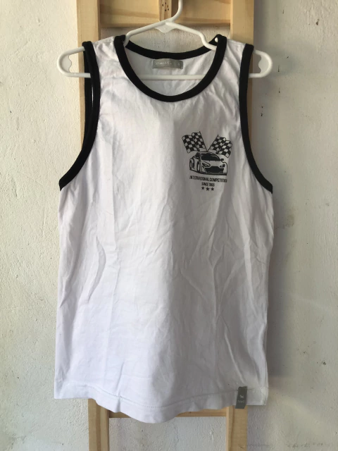 8A | Outlet- Musculosa blanca y negra. MIMO. Talle 8 años.