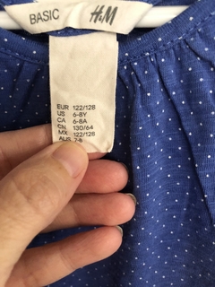 Remera azul con voladitos en manga. HYM. 6 años. - comprar online