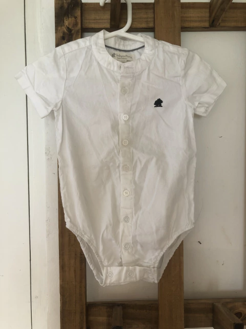 Body camaisa blanco. Baby Cottons. 9 meses.