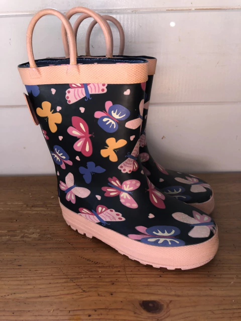 Botas de lluvia azul con mariposas. Talle 25.