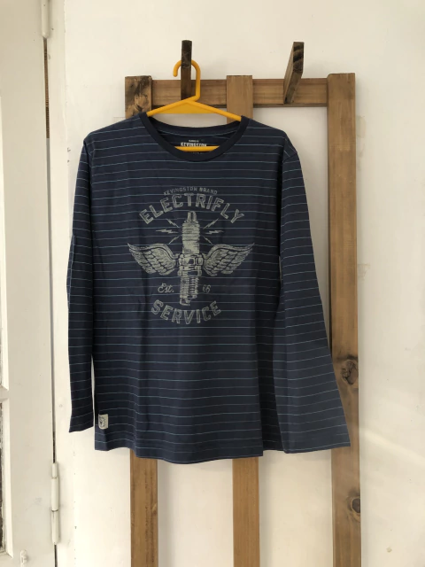 12A | Remera azul con rayas ML. Kevingston. 12 años.